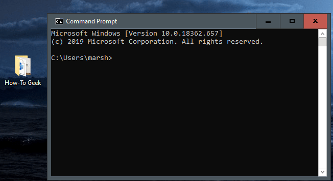 Comment changer de répertoire dans l'invite de commande sous Windows 10 7 Un GIF animé montrant un fichier glissé et déposé dans l'invite de commande.